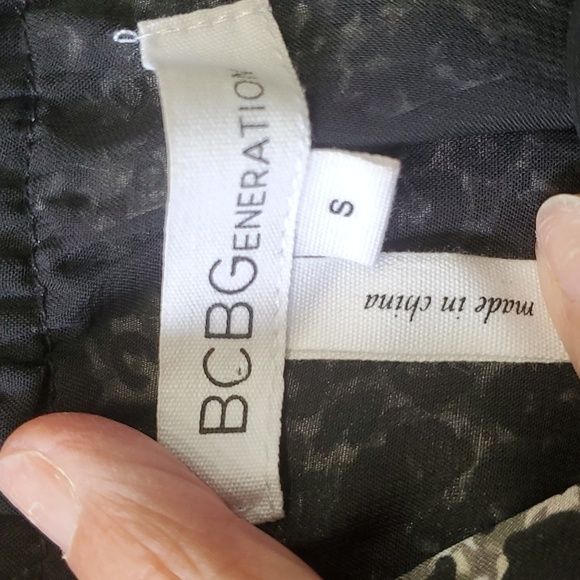 BCBG Generation romper, animal print. Size small.  Polyester.  Washable. - Picture 9 of 13